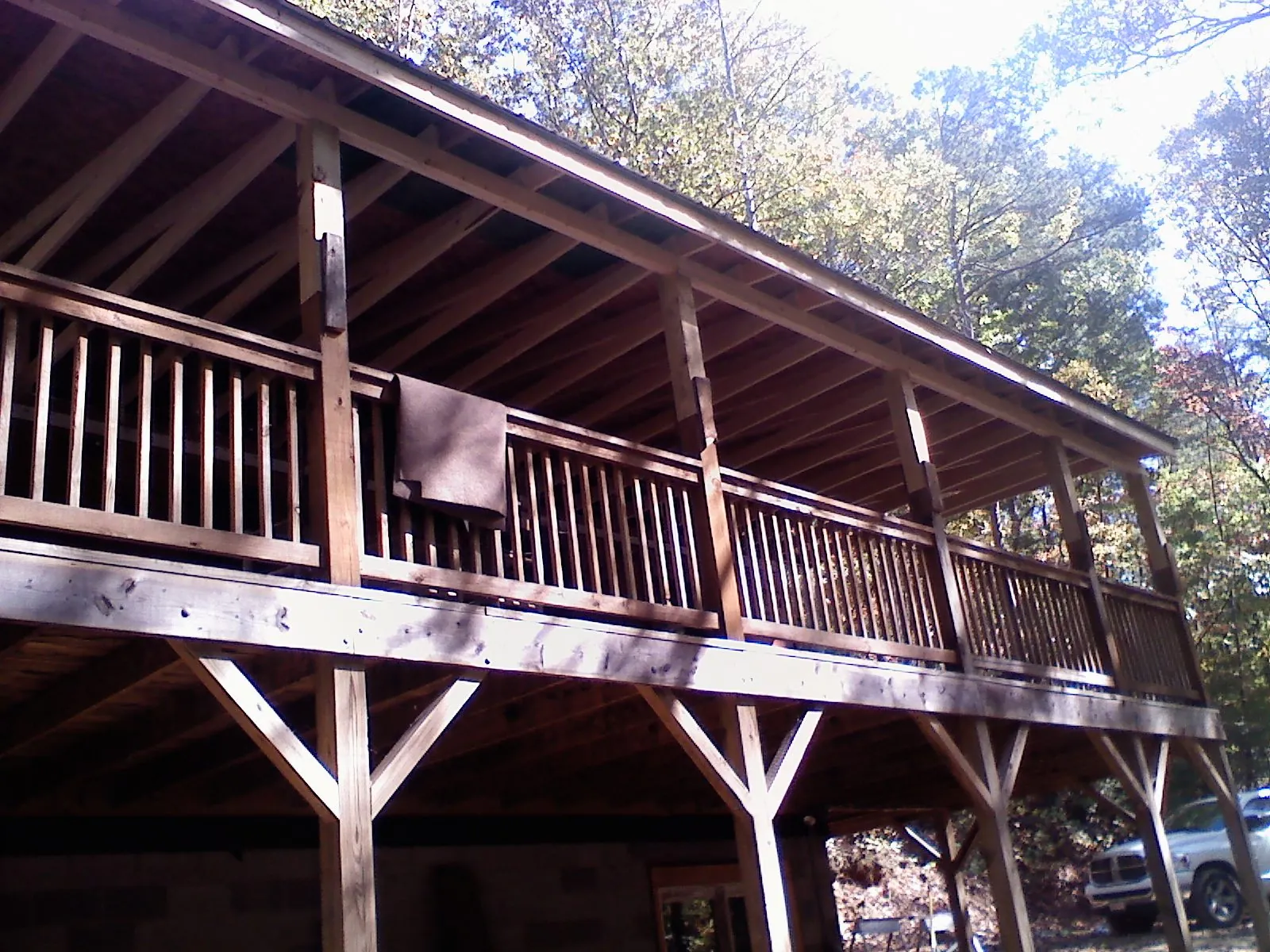 Timber framing under a new elevated porch and deck — Roof Leak Repair in Peconic by Roofing Brothers